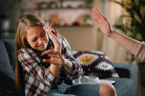 child being smacked by parent
