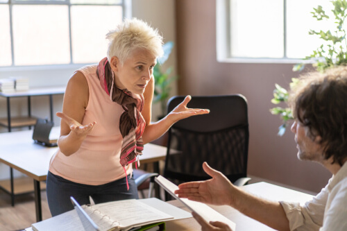 Angry woman shouting at man