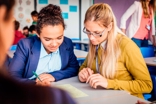 Teacher one to one with pupil