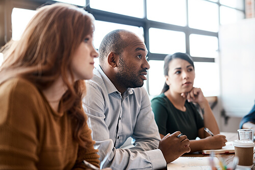 Teachers holding a safeguarding review