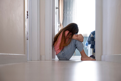 Teenager stressed at home during holiday